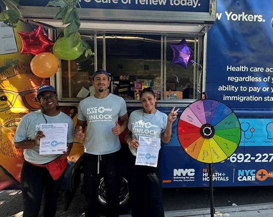 Members of the street team pose before distributing flyers and prizes